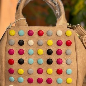 Trendy beige Alyssa purse.